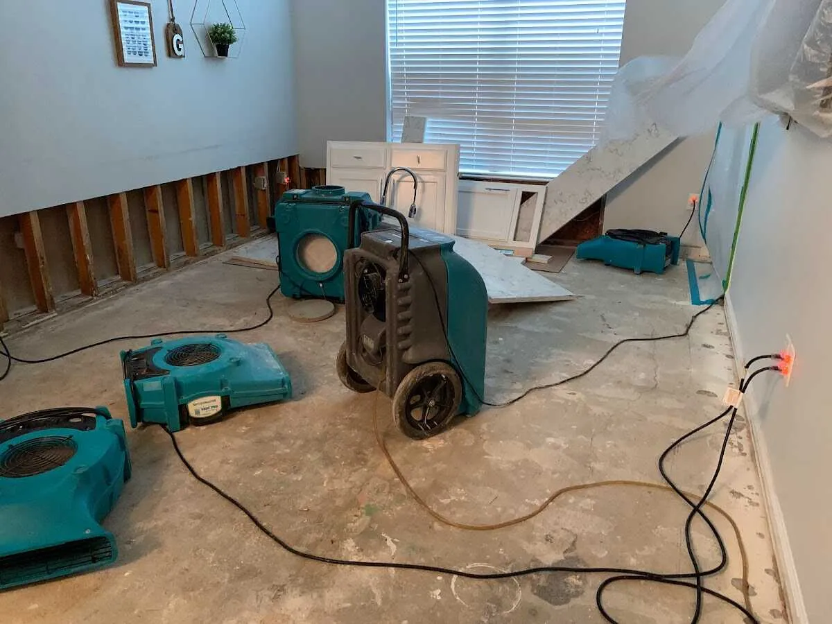 Dehumidifier in flood-cut room for Water Damage Restoration in Norwalk